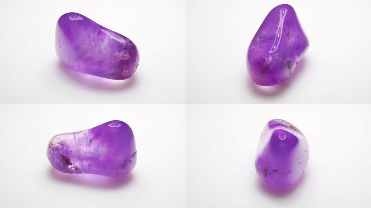 背景镊子中的天然紫水晶