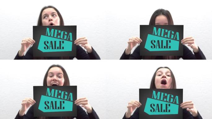 微笑的女性青少年展示大型销售标签标志，销售概念