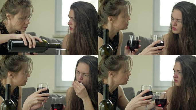 两个女朋友正在喝酒。一个女人哭了，另一个安慰她。试图用酒精缓解压力