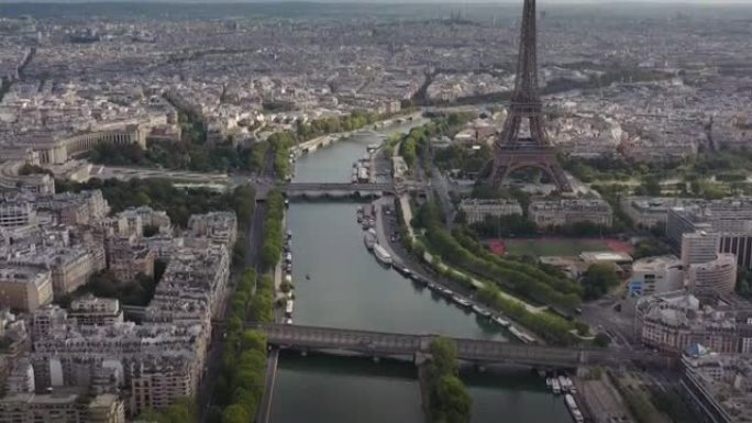 阳光明媚的云日巴黎市中心著名的塔广场河畔湾空中俯拍全景4k法国