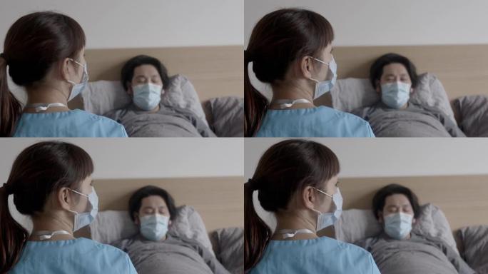 亚洲女护士坐在病患旁边的床上