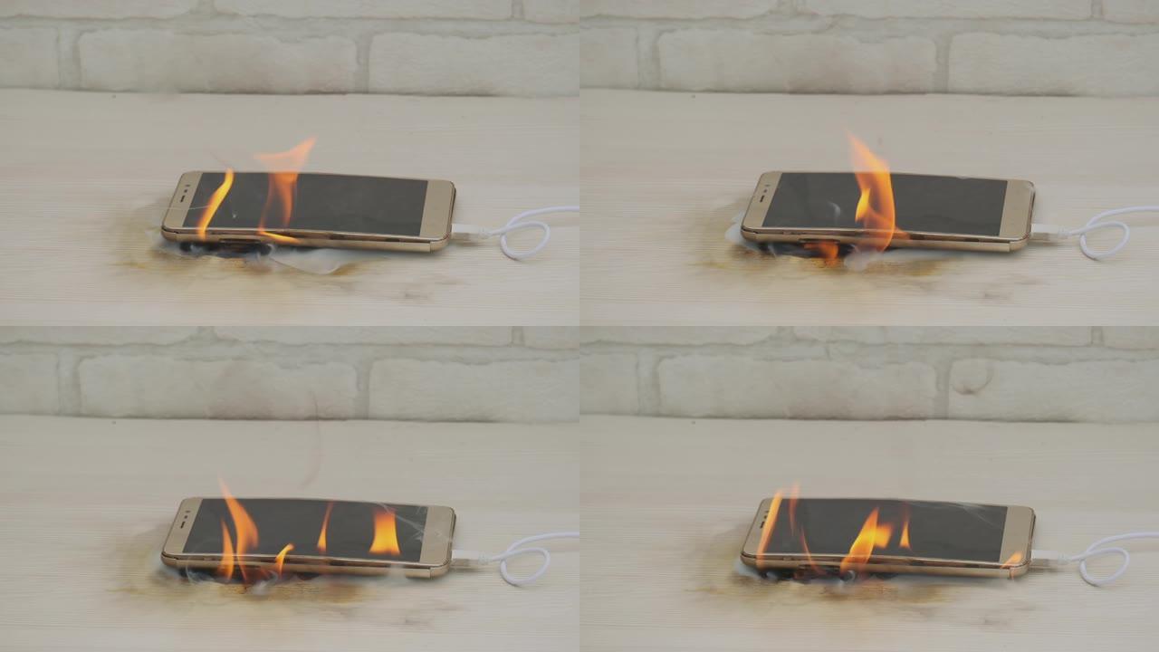 躺在家里或办公室的桌子上充电时，电池膨胀的手机会燃烧红色火焰。房屋火灾原因的概念
