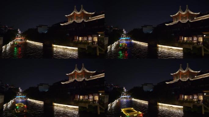夜间照明南京市著名古城河船交通全景4k中国