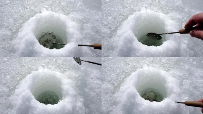 渔夫从洞里挖出雪
