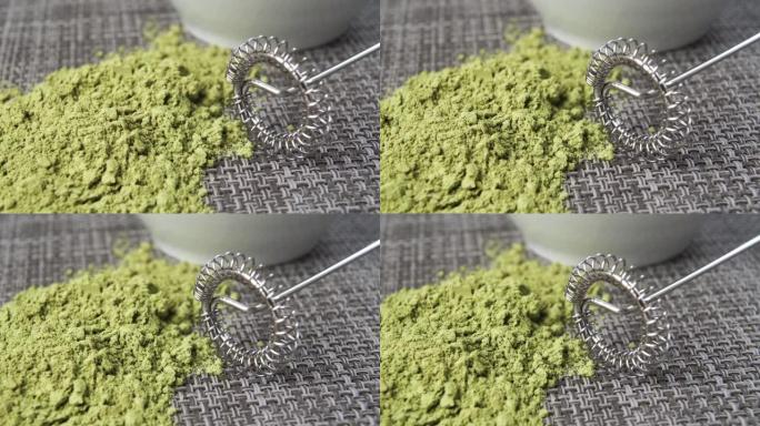 传统日本抹茶绿茶粉和金属电动搅拌器
