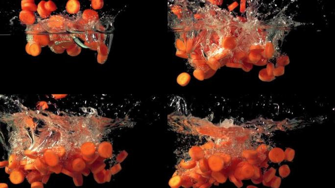 超级慢动作的胡萝卜碎片溅入水中。以1000 fps的高速相机拍摄。