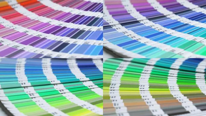 图形设计师从调色板指南中选择颜色。发现最好的潘通颜色