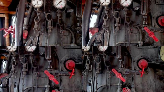 带管道、阀门、仪表和指示器的老式蒸汽机车锅炉的4k多莉视频