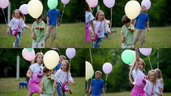 一群快乐的孩子带着五彩气球嬉戏地奔跑