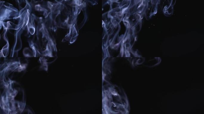 黑色背景上漂浮在太空中的一团白烟，尘埃颗粒。白烟，一团冷雾，蒸汽在慢动作。特写