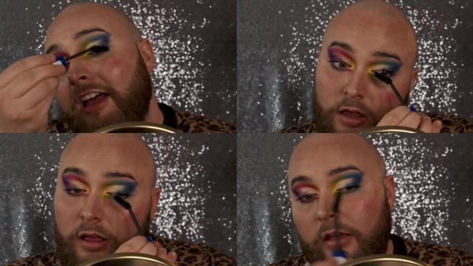 一名男性化妆师在睫毛上涂上睫毛膏的4k视频片段