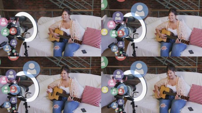 女性视频记录器上的人物图标在家里播放吉他录制视频日志
