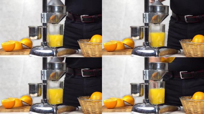 从橙子中获取橙汁的印刷机的操作