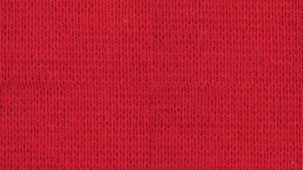 纺织背景-深红色棉弹性弹性织物。微距拍摄。