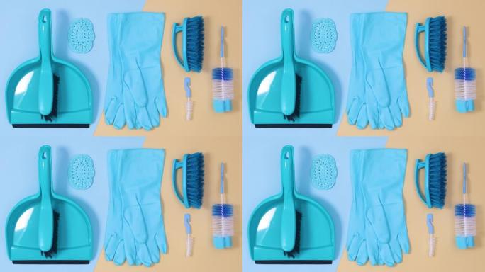 蓝色清洁家用工具出现在米色亮蓝色背景上。停止运动平铺