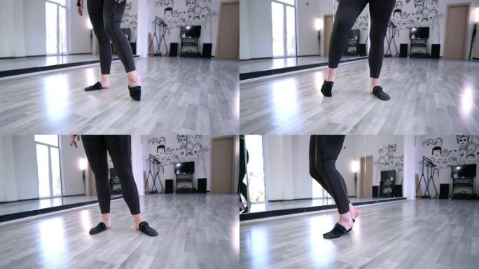 现代芭蕾舞演员，可以伸展脚和脚趾，因此她可以避免在激烈的训练中受伤
