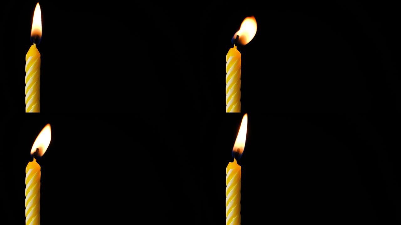 孤立的黑色上的生日蜡烛。