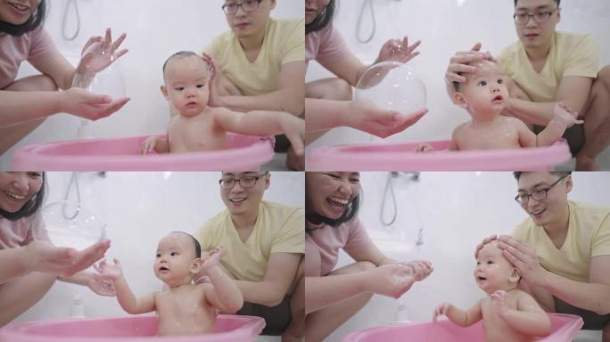 亚洲父母婴儿洗澡女儿