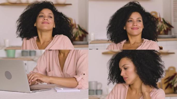 可爱的非裔美国妇女在网上学习或远程工作，使用笔记本电脑，疲倦和放松。黑人女性坐在明亮厨房的桌子旁摆姿