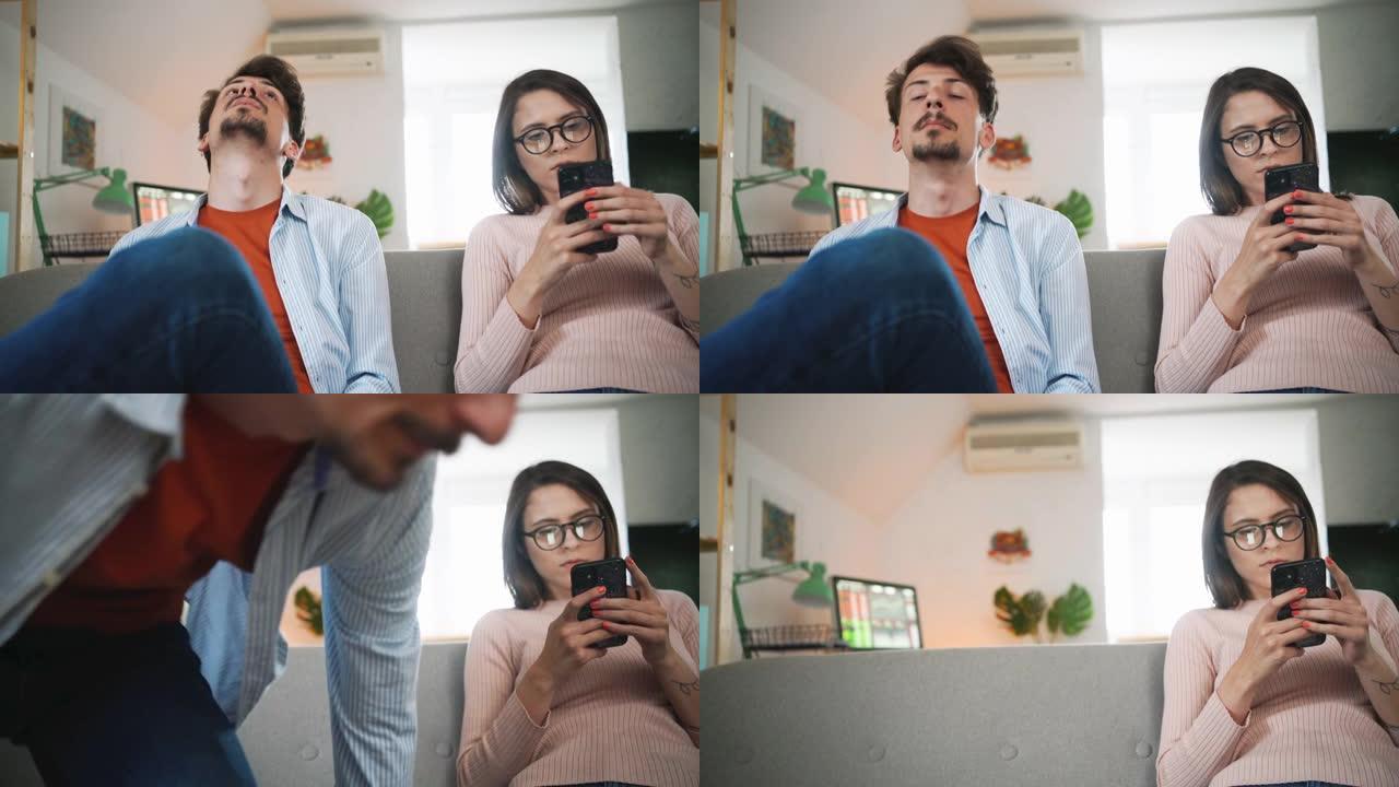 某男子因女友使用智能手机而烦恼