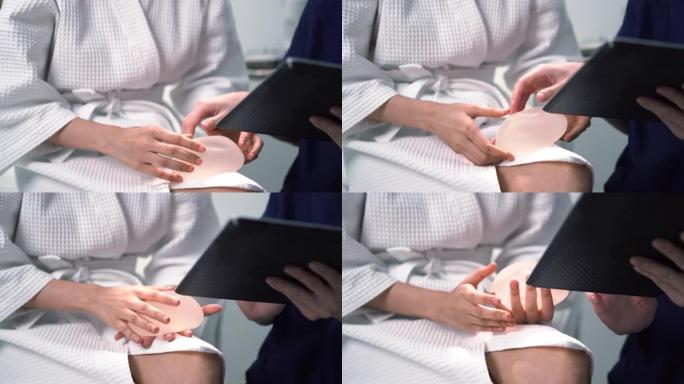 来隆胸或美容的患者试图让医生给他们看平板电脑，以触摸硅胶。
