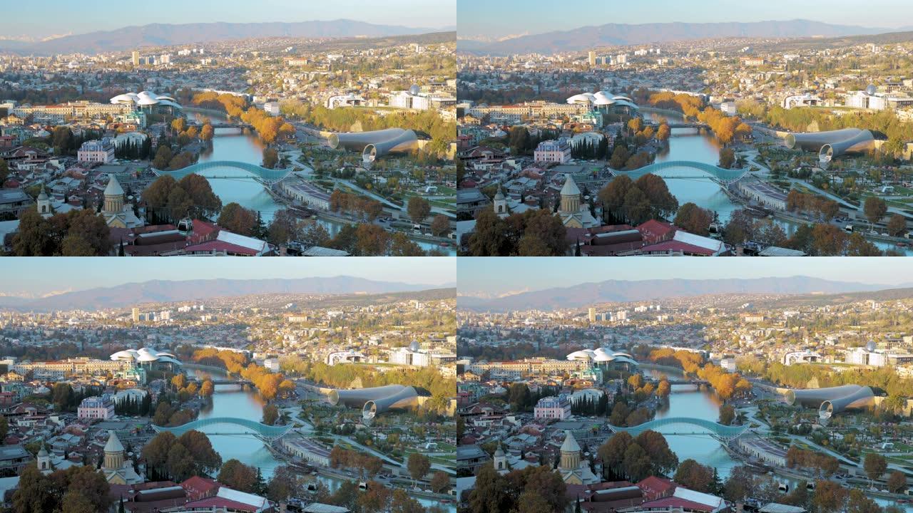 格鲁吉亚第比利斯。秋季傍晚著名地标的俯视图。格鲁吉亚首都天际线城市景观。正义之家，和平之桥，音乐厅，