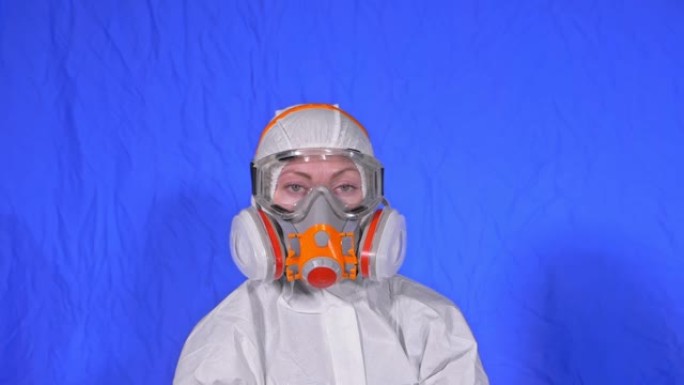 女人特写肖像佩戴防护医用气溶胶喷漆面罩呼吸器。概念健康安全N1H1病毒冠状病毒流行病2019 nCo