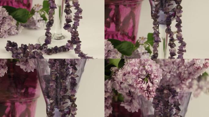 花瓶和紫水晶珠子中的紫丁香