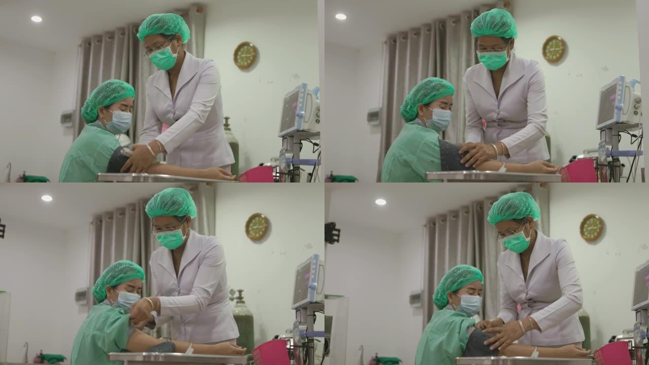 护士收紧病人的上臂测量血压-库存视频