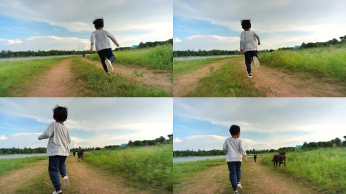 小男孩在路上奔跑乡下土路