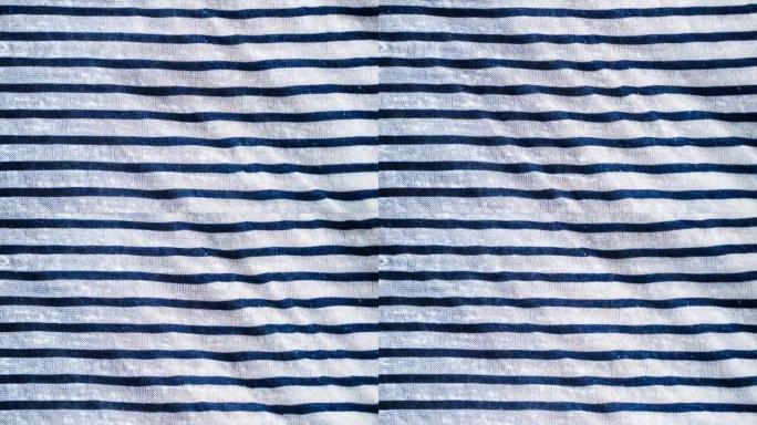 白色和蓝色条纹图案纹理背景。亚麻棉宏观拍摄，装饰编织。