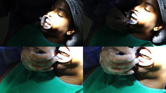 专业牙医在诊所与病人一起工作
