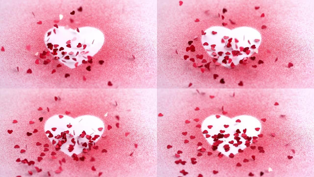 红心落在粉红色粉末上形成白色心脏的动画