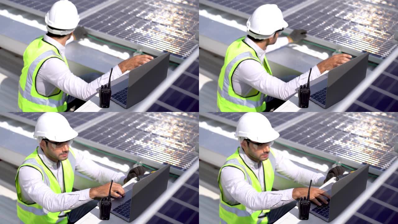 工程师通过电子设备检查太阳能电池板或光伏电池的构造。绿色电力的工业可再生能源。在塔顶工作的工厂工人。