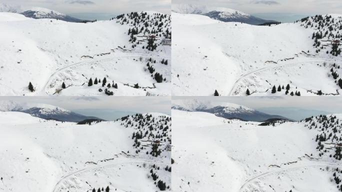 马其顿滑雪胜地Popova Shapka村越野行驶的雪猫，ratrack的惊人鸟瞰图