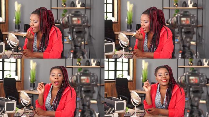 4k视频非洲女人用专业刷子在镜子前涂红色唇膏