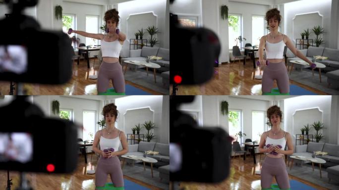 女性健身视频记录器在家锻炼