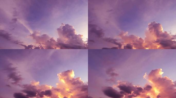 日落洋红色蓝天上的彩色紫色黄云