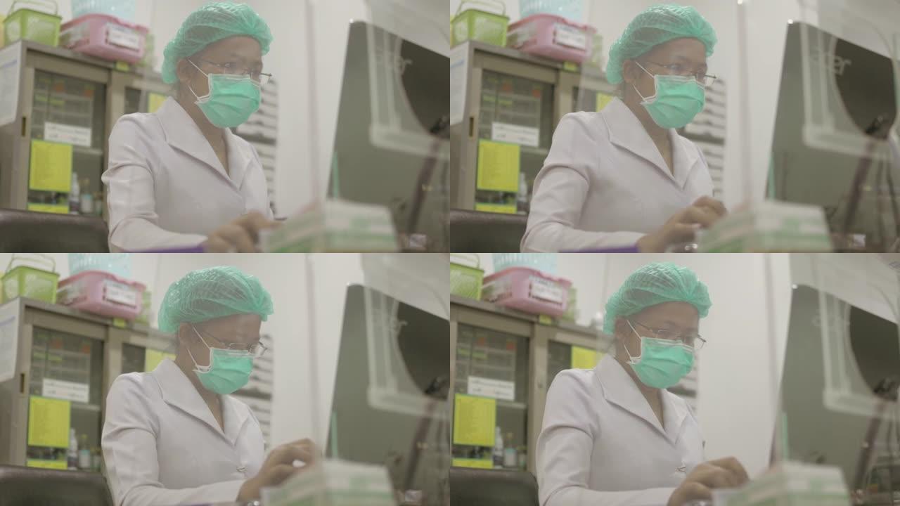 女高级护士在云网填写一些更新信息，为医院下一步治疗做准备-库存视频