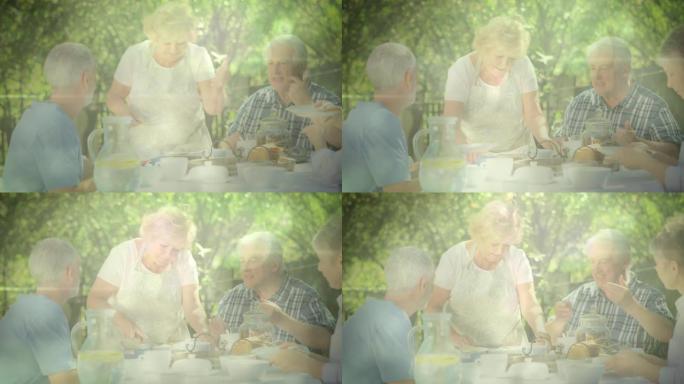 在花园里吃饭的老年人的发光动画
