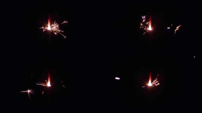 火花 (孟加拉大火) 在黑色背景上燃烧。慢动作，300fps，Blaskmagic Ursa Pro