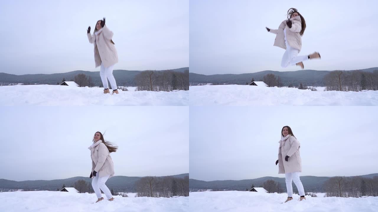 一个年轻的女孩享受生活，享受纯净的雪。在下雪的冬日里，在大自然中积极娱乐。