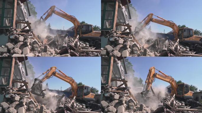 挖掘机铲斗将被摧毁的建筑物中的垃圾和杂物装载到卡车中。房屋拆迁