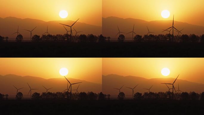 戈壁滩夕阳下的风力发电大风车