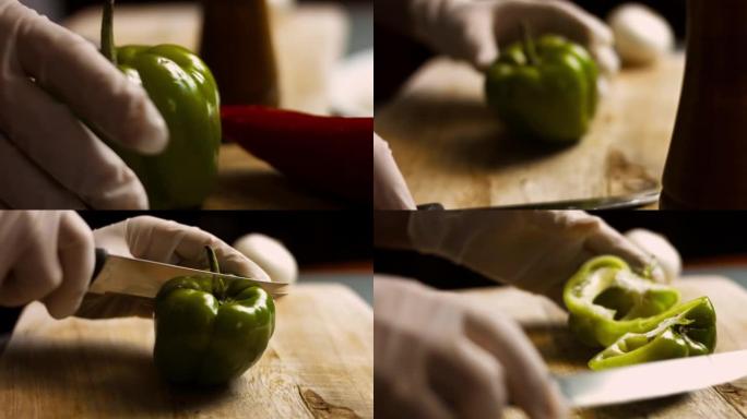 双手在砧板上切碎新鲜的青椒，然后用刀扔辣椒。快。