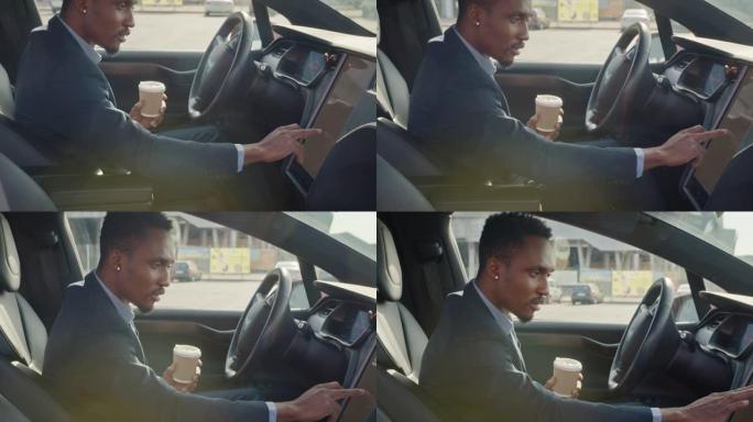 专注的非洲男子坐在驾驶座上喝杯咖啡，使用仪表板进行导航的侧视图。穿着正装的商人停下来检查方向。坐在车