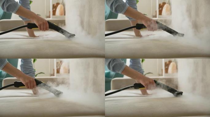 用蒸汽清洁器手清洁沙发，家庭清洁概念。
