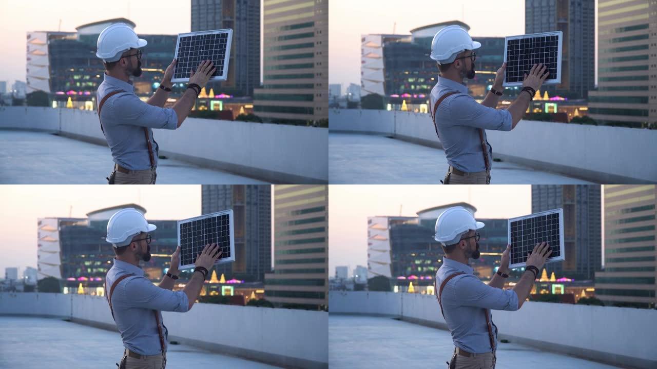 太阳能发电厂工程师计算并找到阳光的方向，以便在早晨或日落时在摩天大楼上的urbun city工厂的屋