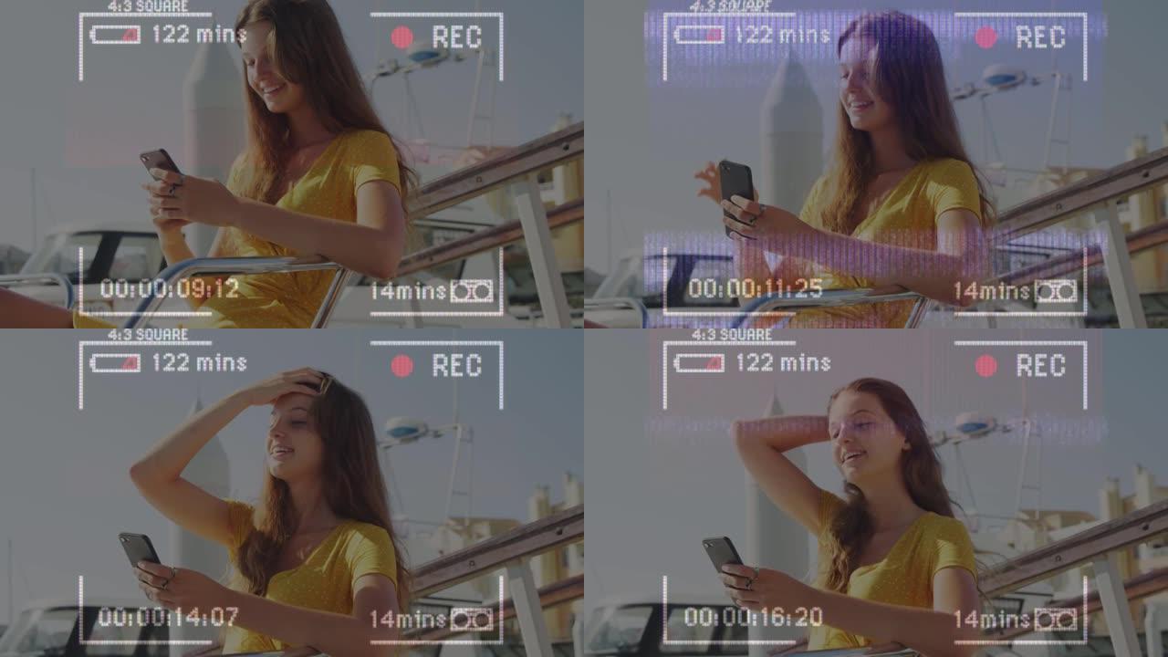 视频录制界面的动画，使用智能手机在阳光下的快乐女孩在船上