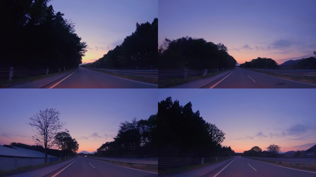 夕阳美丽的郊区路晚霞傍晚高速路路上拍摄